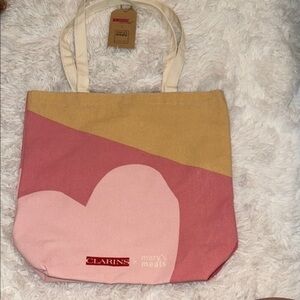 Clarins Pink and Tan Geometric Tote​